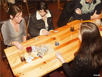 Naughty girls drinking and smoking in pub