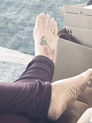 Relaxing with a belly and pussy full of cum.