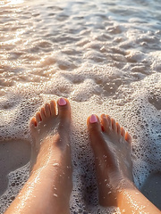FEET ON SAND